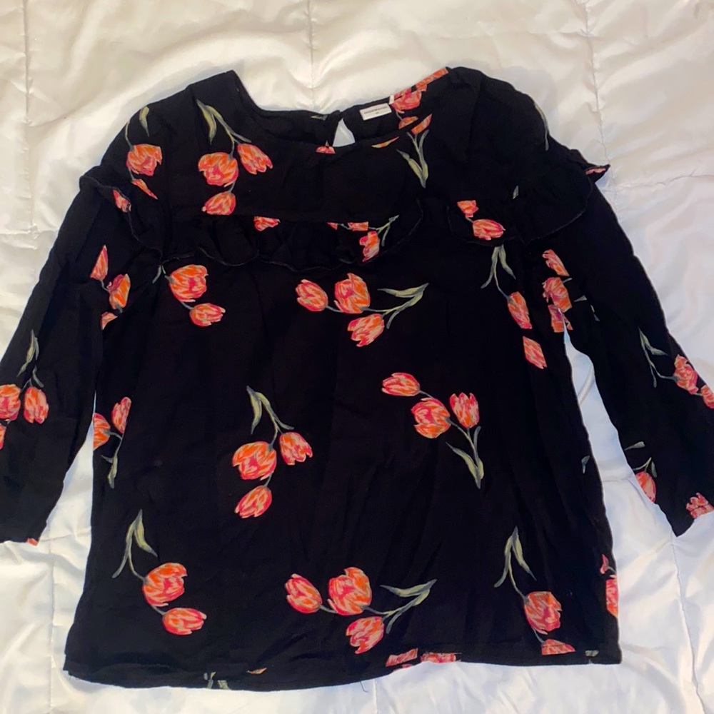 Medium black and pink floral blouse. Used but good condition.